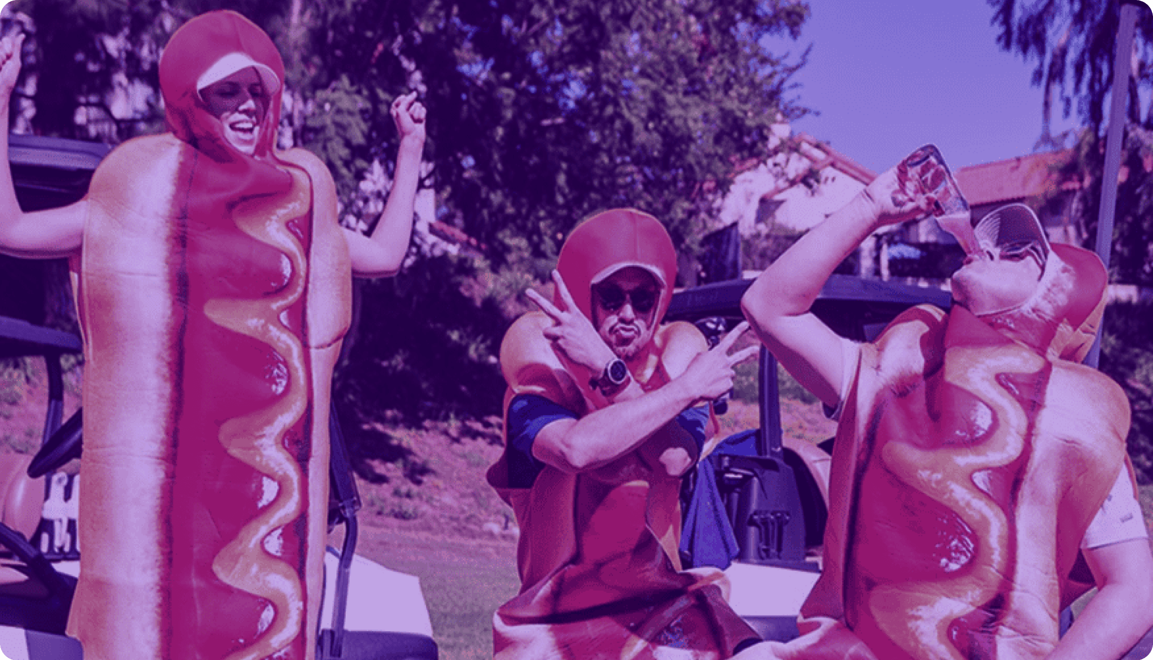 People socializing wearing sausage outfits